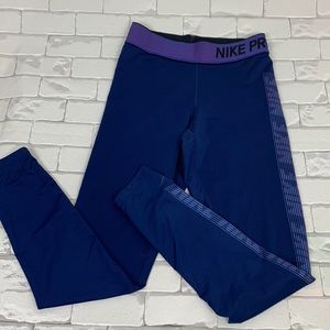 Nike Pro Leggings.  Purple iridescent. Nike logo on waist/side. Size Small